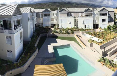 L'Ermitage-les-Bains Apartment | à deux pas du lagon bel appartement quartier très vivant à l'hermitage