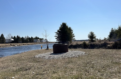 Stokes Bay RV Rental | #0 Enjoy a waterfront view from your own trailer with a deck & sunroom