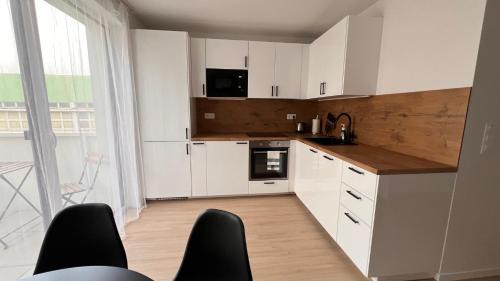 Raca Apartment | 1,5 room Apartment with terrace, new building, B1
