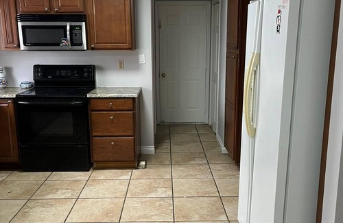 Caledon House | 1 Bedroom 1 bathroom apartment with kitchen, laundry room and living room