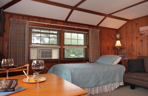 Rockport Apartment | 1 Bedroom, 1 Bathroom, Living room with twin day bed, Kitchenette Deck