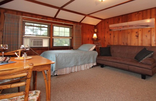 Rockport Apartment | 1 Bedroom, 1 Bathroom, Living room with twin day bed, Kitchenette Deck