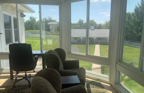 Forest Grove House | 1-bedroom guesthouse with sunroom and gas fireplace on Bloom Farm in Doylestown