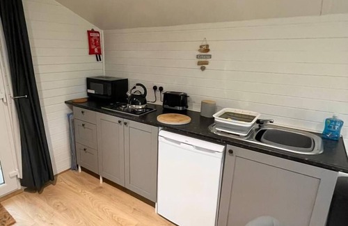 Corwen Cabin | 1 Bedroom Log Cabin in Parc Pen y Bryn Sleep 2/3
