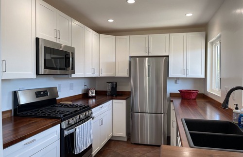 City Heights House | 10 Min to Downtown, tranquil 2 BR House with patio and deck, free parking