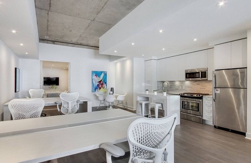 Wellington Place Condo | 100% Walk Score! NEW Large, High Ceilings, Designer Luxury Open Style Live/Work!