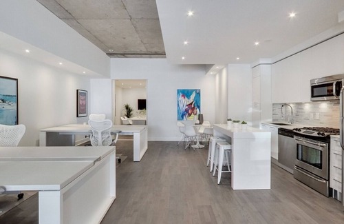 Wellington Place Condo | 100% Walk Score! NEW Large, High Ceilings, Designer Luxury Open Style Live/Work!