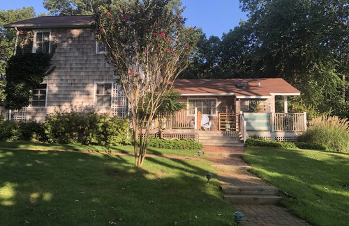 Clearwater Beach House | 1137 SPRINGS FIREPLACE RD- Charming Cottage with Glorious Sun Room by the Bay