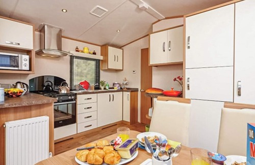 Wigton House | 12ft-wide caravan with one double and one twin.