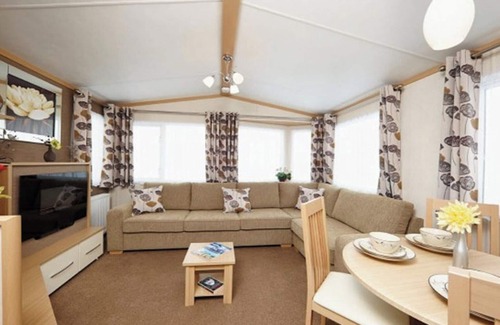 Wigton House | 12ft-wide caravan with one double and two twin.