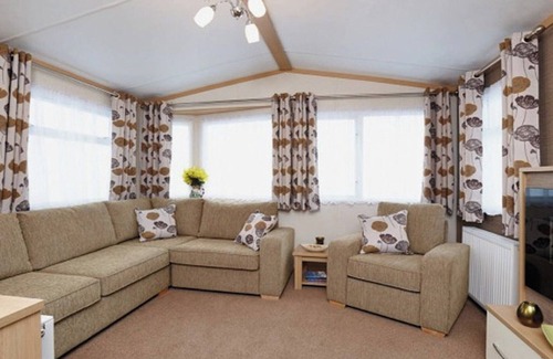 Wigton House | 12ft-wide caravan with one double and two twin.