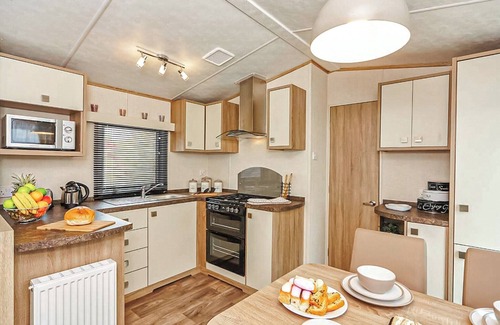 Wigton House | 12ft-wide caravan with one double and one twin.