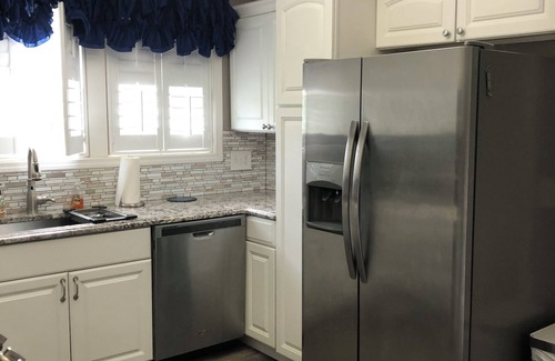 Tyler House | 1912 Farmhouse has large, covered porch & fire pit! Near Casino & The Pinnacle