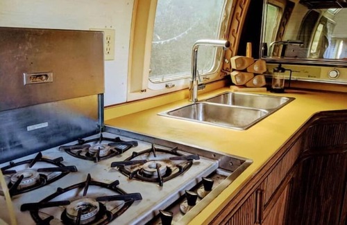 Hammond House | 1972 Airstream Sovereign Yacht "Silver Burrito"