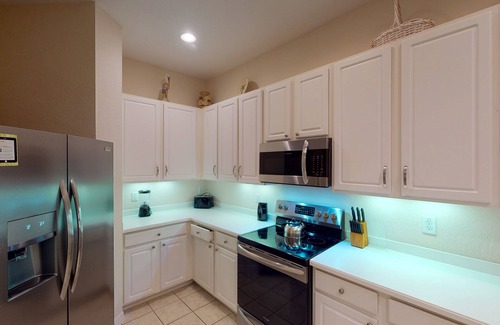 Bahama Bay Condo | 1st floor condo w/limited-mobility access, tennis court, pools, restaurant, gym