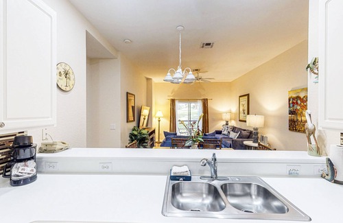 Bahama Bay Condo | 1st floor condo w/pools, restaurant, balcony, tennis court, basketball court