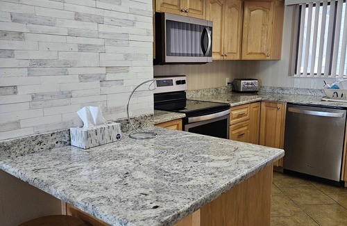 Bethune Beach Condo | 1st floor with river view. Across the street from the beach.