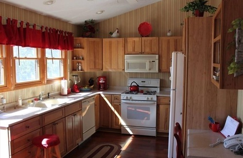 Central Lake House | 2+ Bed East Torch Lake with Rare Sandy Beach Frontage
