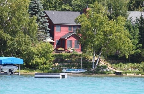 Central Lake House | 2+ Bed East Torch Lake with Rare Sandy Beach Frontage