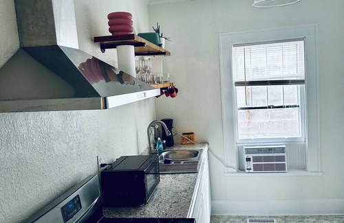 Leadsville Apartment | 2-bedroom apartment in downtown Elkins with AC, a balcony, and WiFi.
