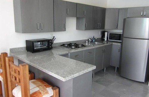 Flamingos Condo | 2 Bedroom Beachfront Condo, Beautiful Ocean and Pool Views
