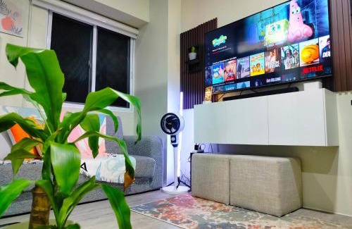 CSJDM Apartment | 2 BEDROOM CONDO close to SM Tungko BULACAN ideal for Family Queen bed on Bedroom 1 accessible to Bedroom 2 with sliding doors Free Wifi & Netflix to watch in a comfy sofa & twin bed Access to SWIMMING POOL entry is very affordable and kids get for free