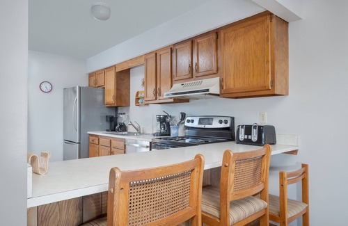 Sea Acres House | 2 bedroom condo with WiFi, outdoor shower, and access to Georgetown Sands community pool and tennis