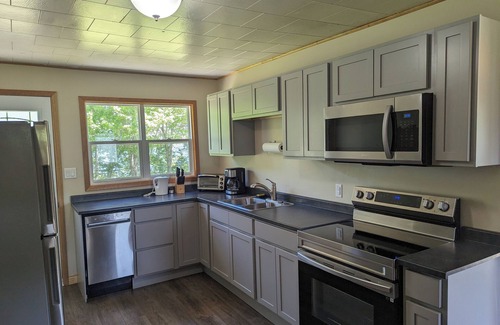 Inverness County Cottage | 2-Bedroom Cottage On Lake Ainlsie Private Beach, Enjoy Fishing & Swimming.