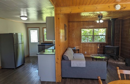 Inverness County Cottage | 2-Bedroom Cottage On Lake Ainlsie Private Beach, Enjoy Fishing & Swimming.