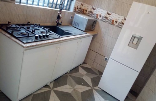Lome House | 2 Bedroom Furnished Living Room, Air-conditioned Legbassito Loménnn