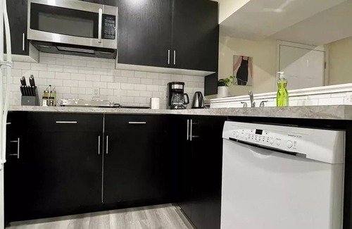 Southwest Calgary House | 2 BR Walkout loaded with amenities