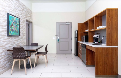Terry Sanford Apartment | 2 Connecting Suites at a Hotel