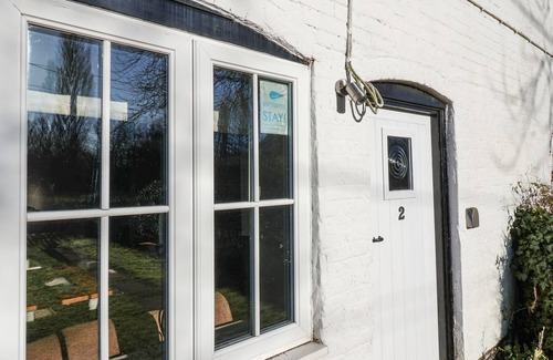 Saxmundham Cottage | 2 GREENSLEEVES, pet friendly, with open fire in Friston