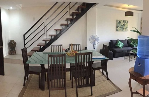 Dauis House | 2 Storey Town House on Lake with Pool in gated secure community.