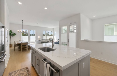 Del Obispo House | 2-story home near the beach with rooftop terrace, hot tub, pool, streaming, W/D