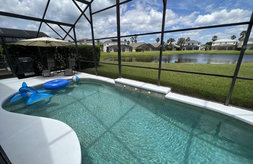 Cumbrian Lakes House | 20 mins Disney,Gated ,lake view,4 bedrooms home with 31/2 bath, pool ,game room