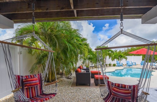 Breezeswept Beach Estates House | 3 Bed/2 Bath Canal Front Home in Ramrod Key 80' Dock and Pool