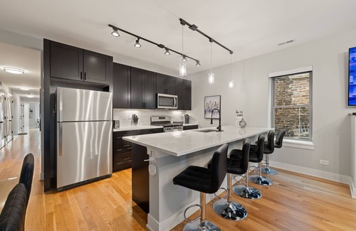 Heart of Chicago Apartment | 3 Bed 2 Bath Chicago Retreat w Balcony & Parking