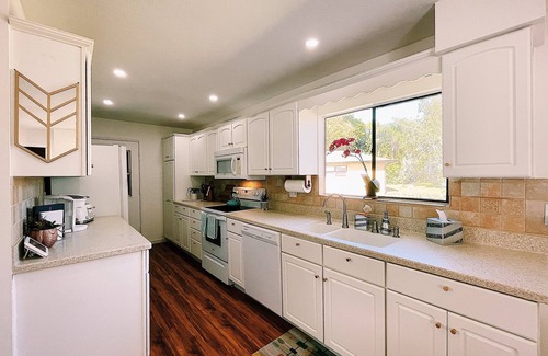 Indian River Estates House | 3 Bedroom 2 Bath One Floor Contemporary with HEATED POOL in Screened Lanai