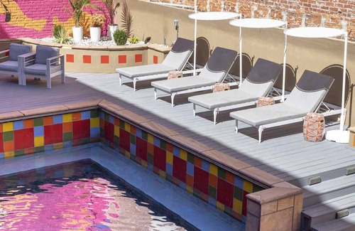 South Main Historic District Apartment | 3-BR/2-BA Apt in Boutique Hotel w/ Pool
