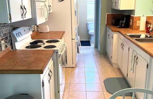 Crescent City House | 3 BR 2 BA House w/Dock on Deep Canal in Bass Capital