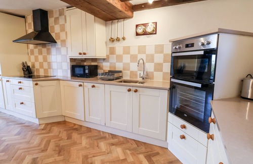 Axton Cottage | 3 PENLLAN COTTAGES, pet friendly, with open fire in Llanasa