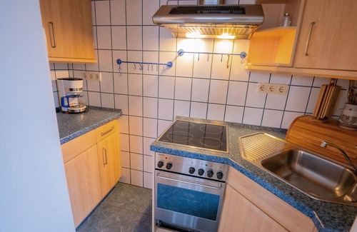 Neuharlingersiel Apartment | 3 room apartment with great lake view, fireplace, terrace and jetty