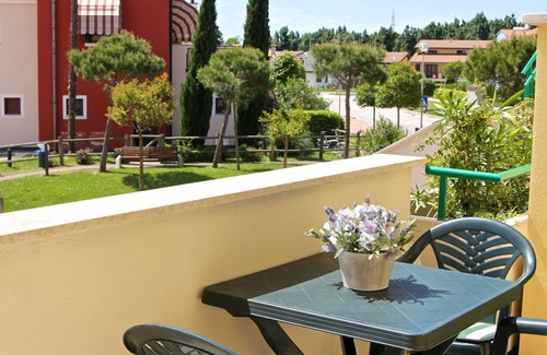 Aprilia Marittima Apartment | 3-room garden apartment. Lignano-Aprilia, air conditioning, pool, dog allowed,