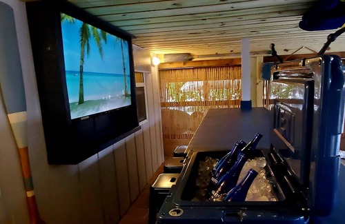 Englewood House | 30 Seconds To Beach Path! Tiki Bar with outdoor TV! Bikes, Kayaks, Sups & more!