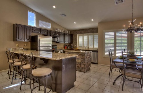 Foothills House | 4 Bedroom Single Story Golf Course Home, Heated Diving Pool + Slide, & Hot Tub