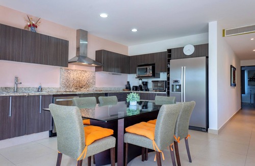 Playacar Condo | 4 Pools and Budget Penthouse in Vaiven. From BRIC Vacation Rentals