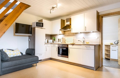 Burglengenfeld Apartment | 4-star vacation apartment Abendrot (75 m2) with small balcony and sunbathing lawn with outdoor seating area