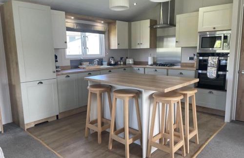 Pevensey Ski Chalet | 42 Woodland Walk Pevensey Bay Holiday Park sleeps 6