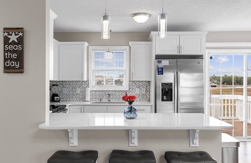 Cherry Grove Beach House | 4BR Marsh-View | 5-Min Walk to Beach + Outdoor TV